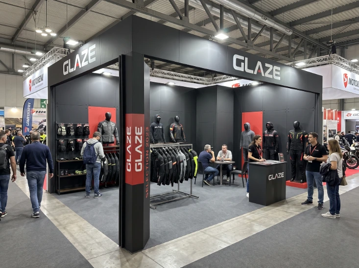 Glaze MFG motorcycle apparel exhibition booth at EICMA 2023 in Milan Italy